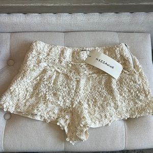 Mezzanine layered lace shorts. Side zip. Stretch waist. Size L.